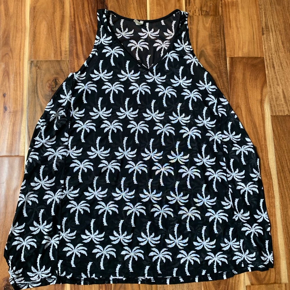 Black and white, sheer coverup. Excellent condition